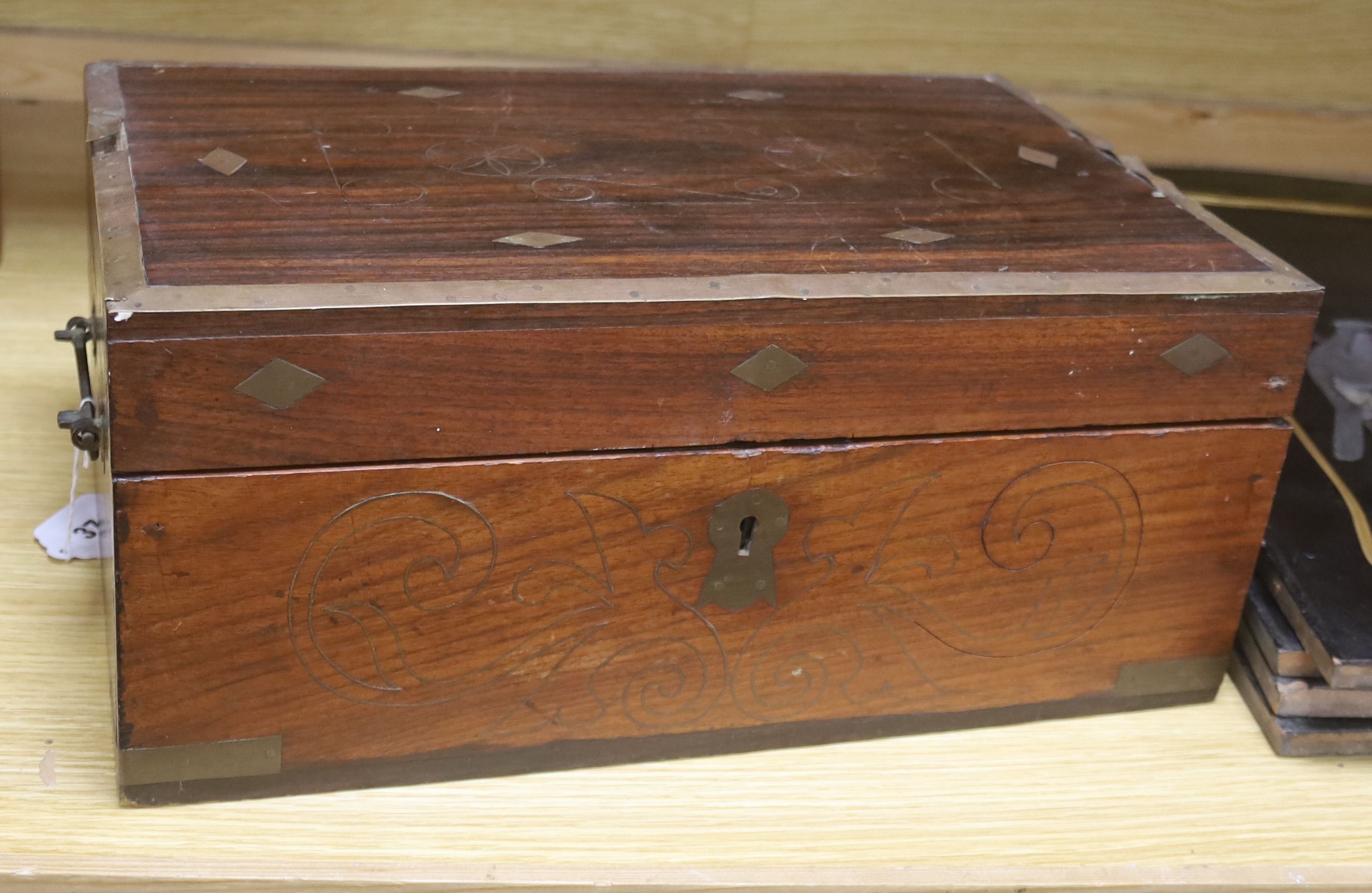 A 19th century Indo-colonial brass inlaid hardwood travelling chest, length 42cm